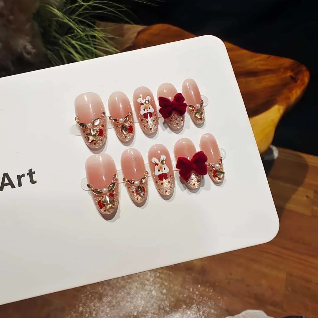 Kunstige negle Cat Eye fransk tip med rhinsten og sløjfedesign