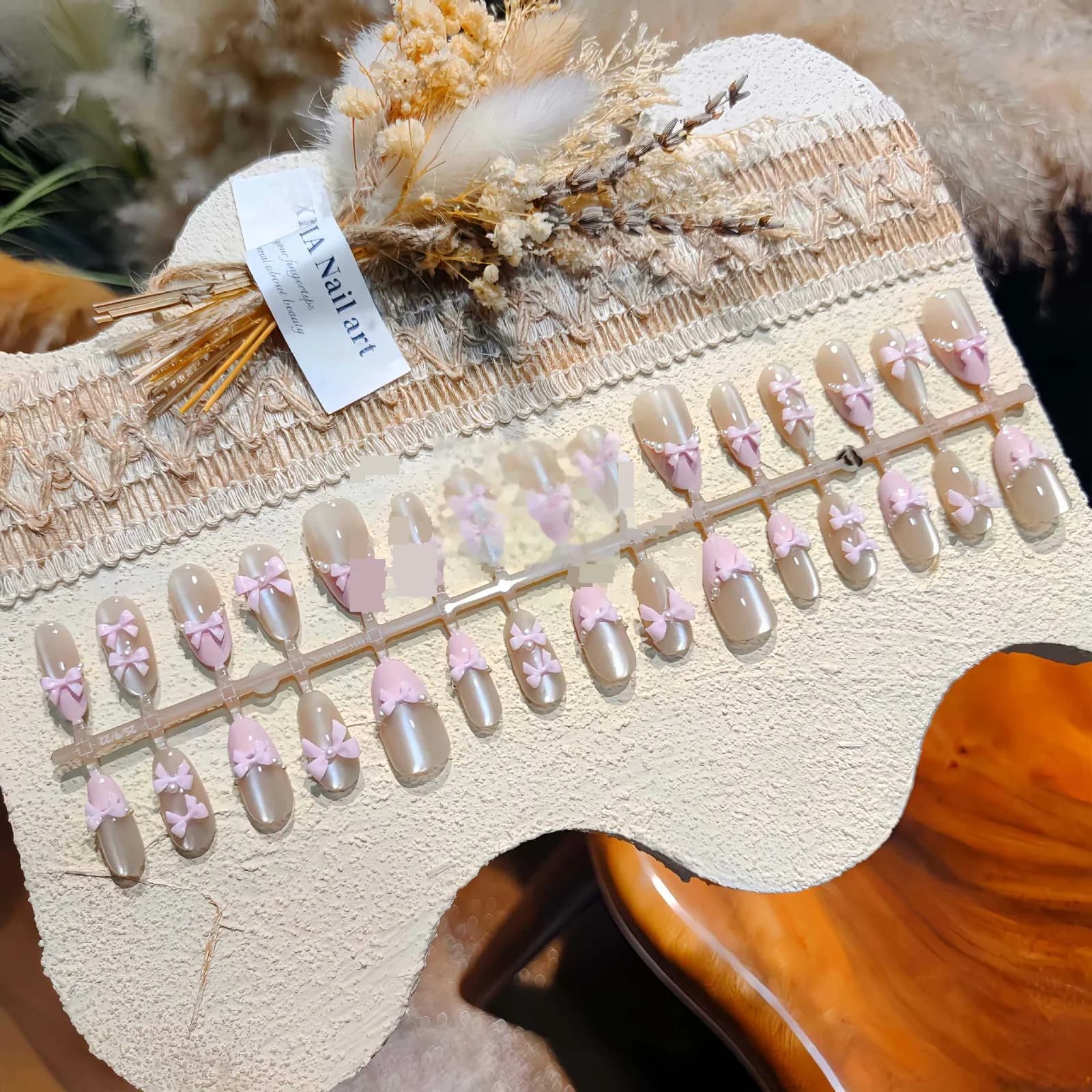 Lyserøde sommerfugl kunstige negle Cat Eye glitter sløjfedesign