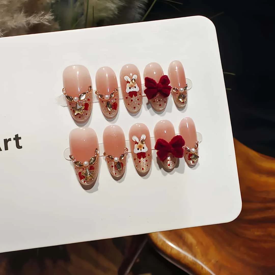 Kunstige negle Cat Eye fransk tip med rhinsten og sløjfedesign